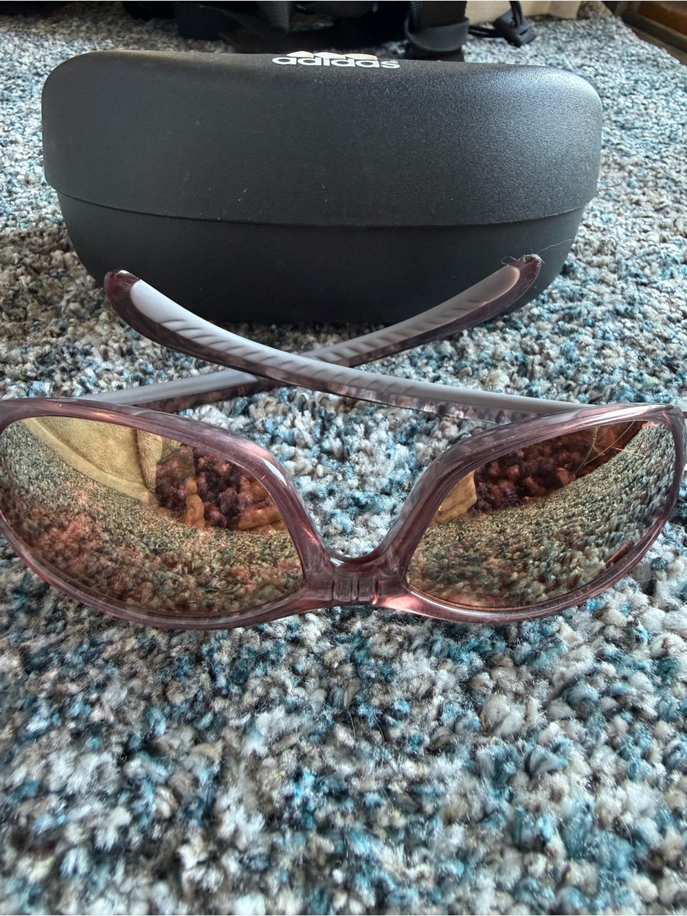 adidas Womenโs Pink Frame Sunglasses with Tinted Lenses